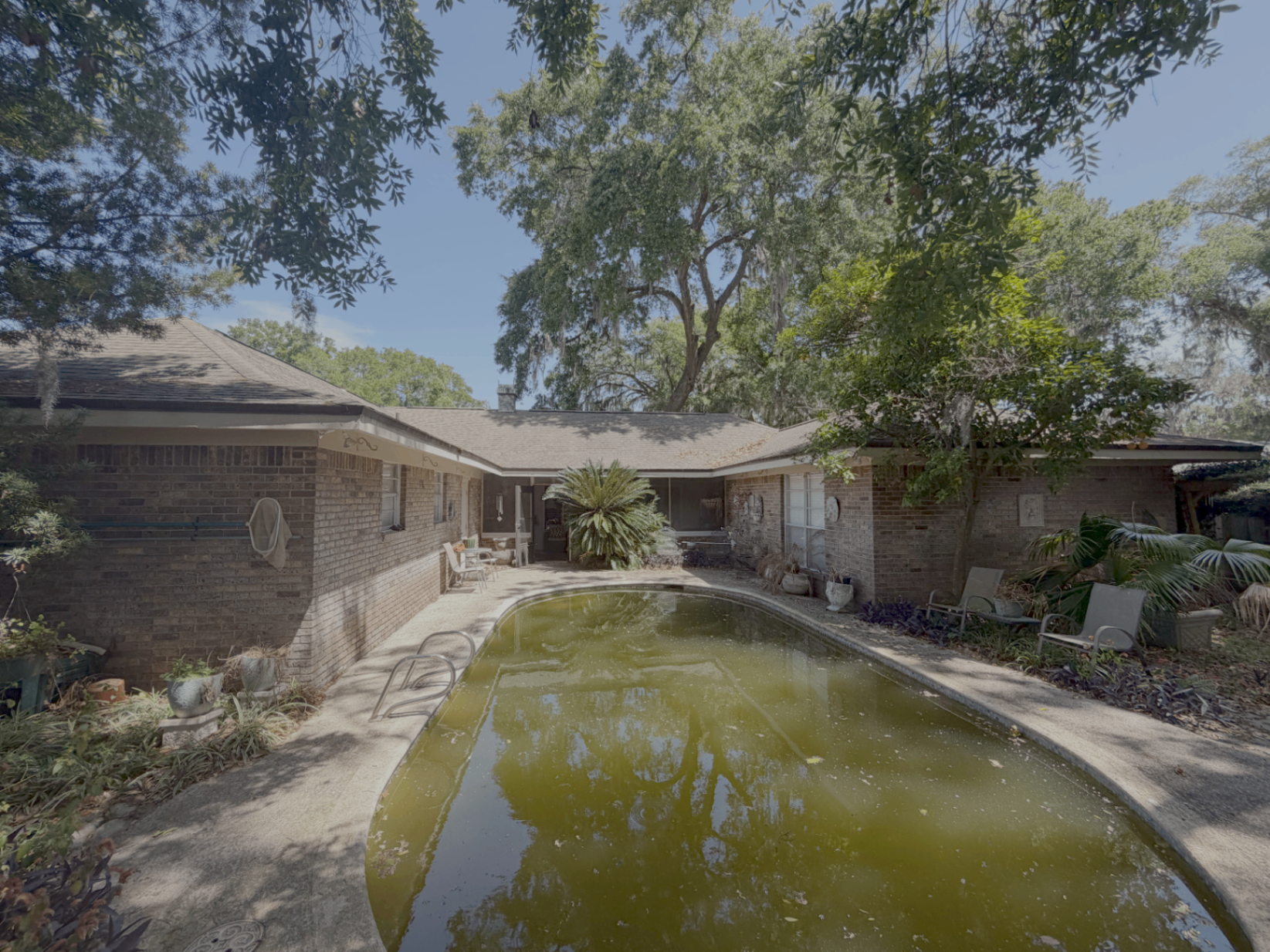 Brick ranch home with backyard pool
