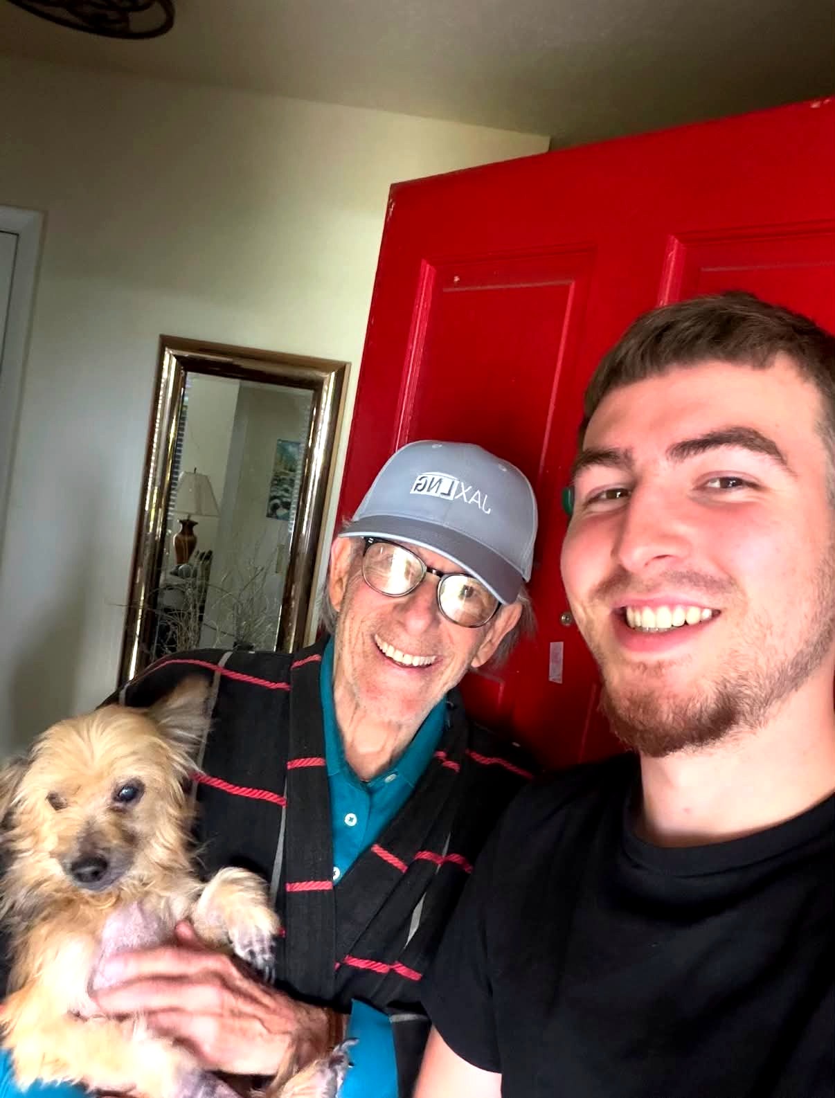 Riley with a happy seller and his dog