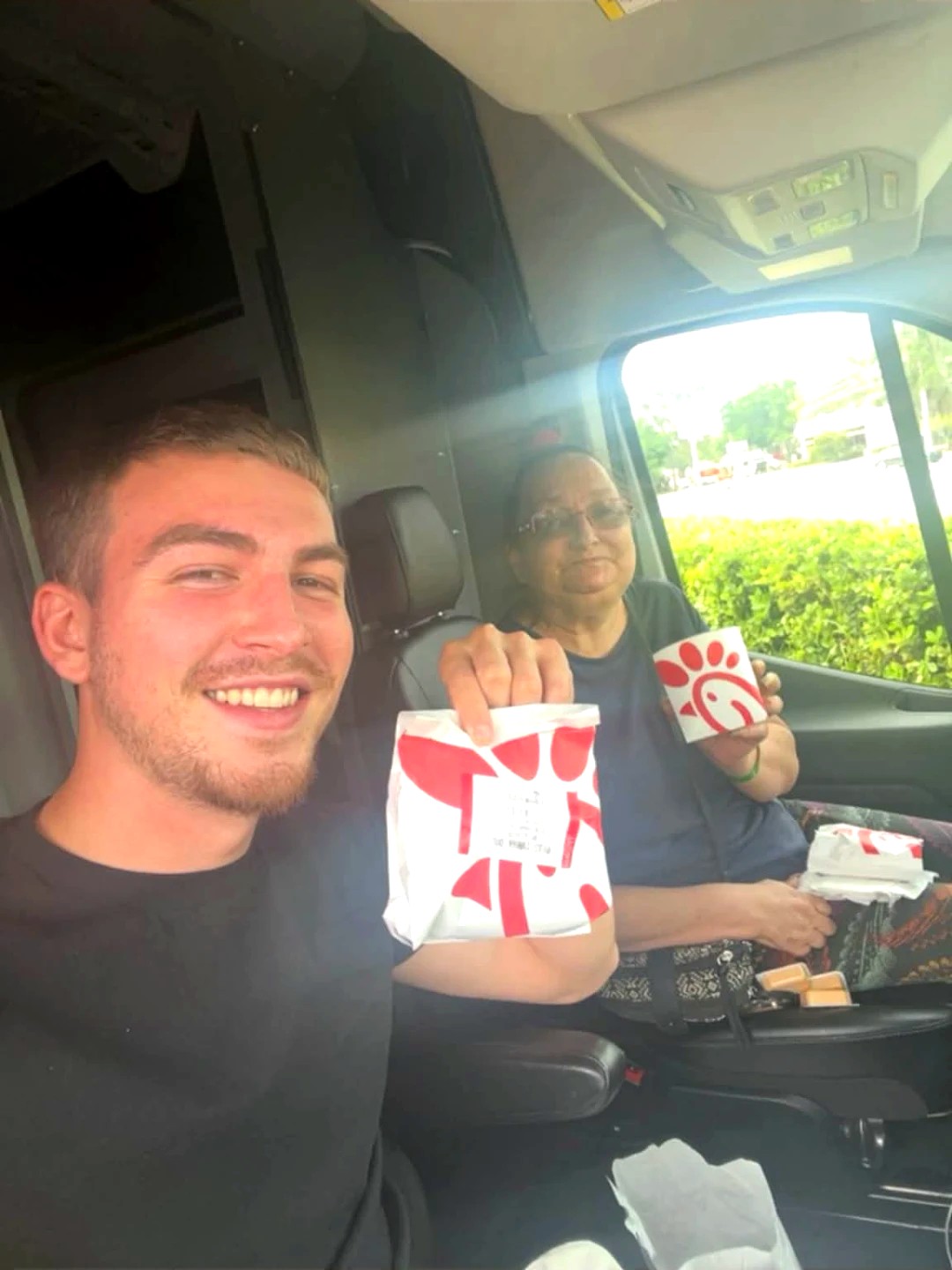 Riley with a seller after closing